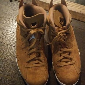 Gold Jordans size 11.5